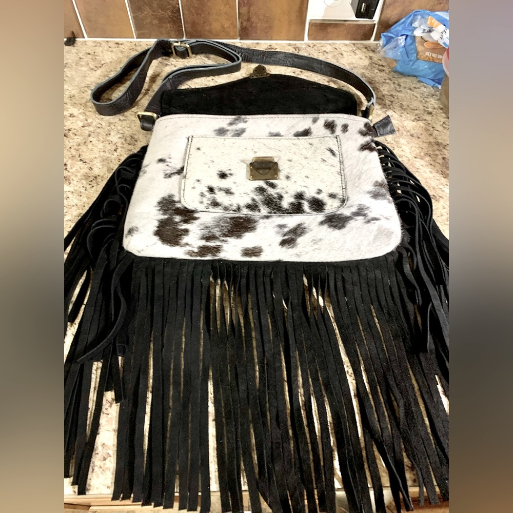 Beautiful 100% cowhide leather brand new Crossbody purse